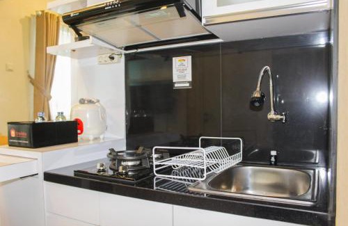 Rawasari Apartment | Minimalist and Homey 2BR Aparment at Green Pramuka near Mall By Travelio