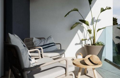 Mejasi Apartment | Minimalist Haven with Balcony and Garage Parking Place