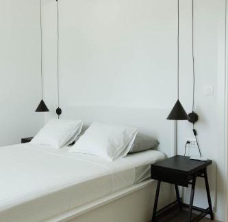 Mejasi Apartment | Minimalist Haven with Balcony and Garage Parking Place