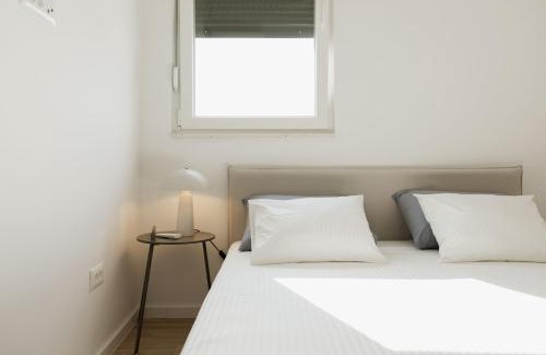 Mejasi Apartment | Minimalist Haven with Balcony and Garage Parking Place