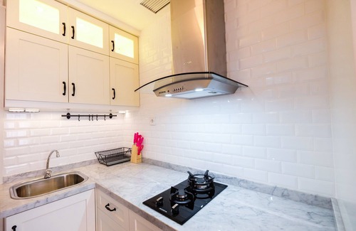 Jatinegara Apartment | Minimalist Studio at Bassura City Apartment By Travelio