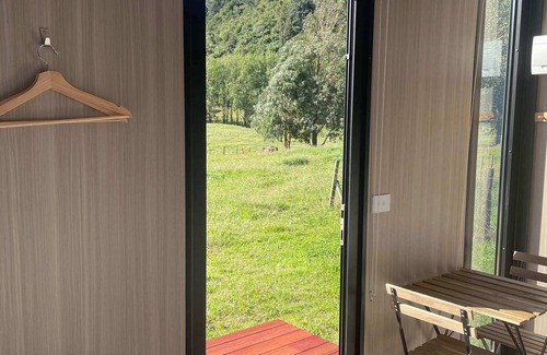 Waihi House | Misty Mountain View by Tiny Away