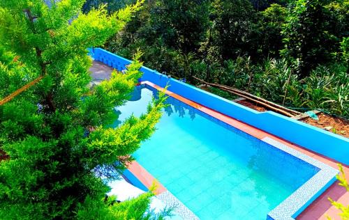 Kunchithanny Hotel | Misty pool villa