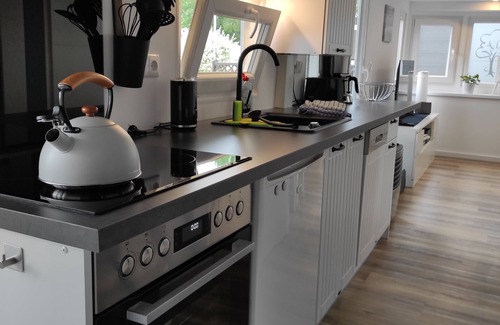 Zetel House | Mobilheim/Chalet direkt am See an der Nordsee
