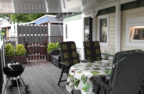 Zetel House | Mobilheim/Chalet direkt am See an der Nordsee