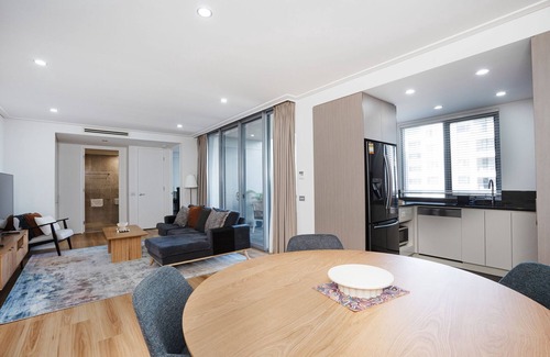 Reid Apartment | Modern 1-Bed Unit with Pool Views and Balcony