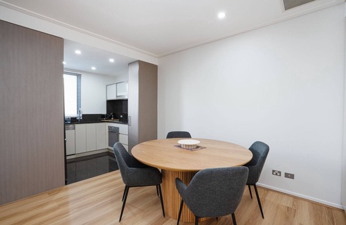 Reid Apartment | Modern 1-Bed Unit with Pool Views and Balcony