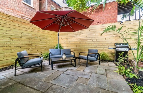 Truxton Circle Apartment | Modern 2 Bed Suite in historic townhouse w patio