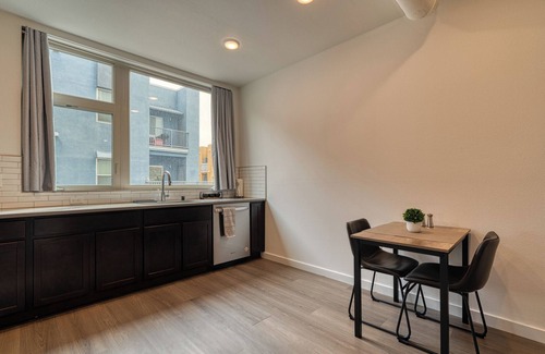 Raynolds Addition House | Modern 2 bedroom townhome in Downtown Albuquerque with a rooftop balcony.
