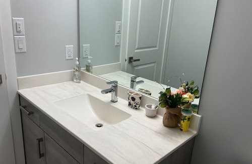 Winnipeg Bed & Breakfast | "Modern 2BR Suite with Private Entrance, Workspace, A/C & Parking in Sage Creek"