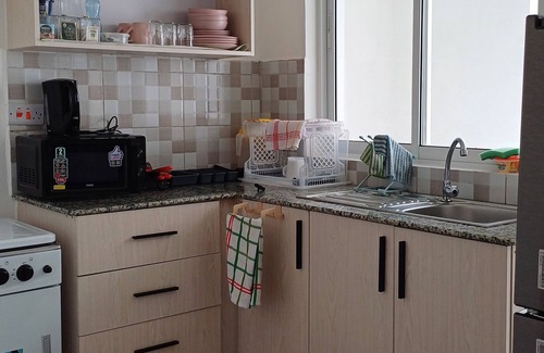 Manyimbo House | Modern 3-Bedroom Apartment with Pool & Basket Ball Court at Buxton Point Mombasa