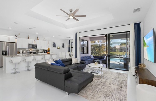 Trafalgar House | Modern 4BD/3BH Waterfront Home with Heated Pool and Golf Access and EV Charger