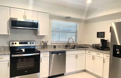 Indian Ridge House | Modern 4BR w/Heated Pool Near Disney
