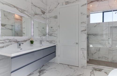Mid City Villa | Modern 5 Bedroom Masterpiece With Rooftop Deck