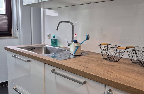 Schwieberdingen Apartment | Modern 5-room apartment with roof terrace and conservatory
