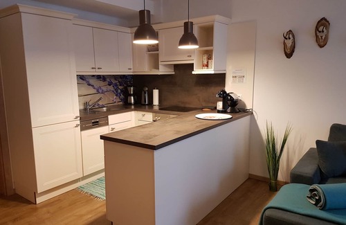 Flattach Apartment | Modern 75m² apartment for 2 to 5 people with fireplace and beautiful mountain views!