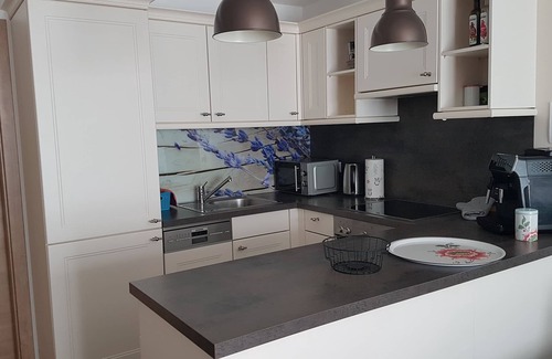 Flattach Apartment | Modern 75m² apartment for 2 to 5 people with fireplace and beautiful mountain views!