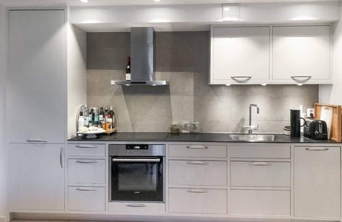 Bastad Apartment | Modern and comfortable vacation apartment with shared outdoor pool, in the summery town of Båstad.