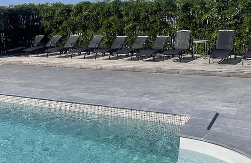 Bastad Apartment | Modern and comfortable vacation apartment with shared outdoor pool, in the summery town of Båstad.