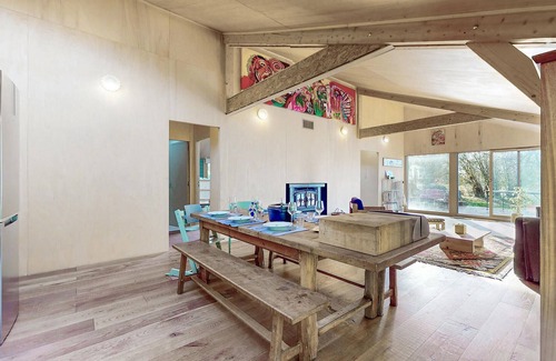 Vieux-Pont House | Modern and practical wooden house with large terrace and natural garden.