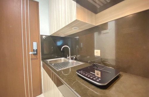 Malabar Apartment | Modern and Spacious Studio Room at Green Kosambi Apartment