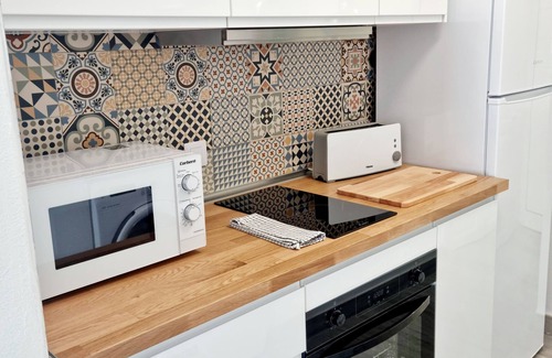 Puerto del Carmen Apartment | Modern apartment ,stunning sea and mountain views in the old town. WiFi and pool