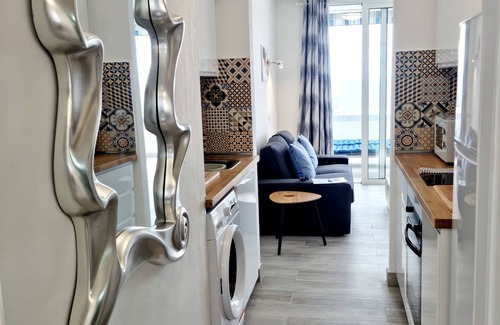 Puerto del Carmen Apartment | Modern apartment ,stunning sea and mountain views in the old town. WiFi and pool