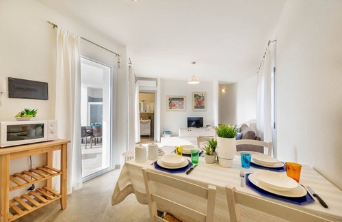 Monte Petrosu Apartment | modern apartment 5 min from the sea with air conditioning, swimming pool, wi-fi