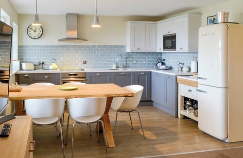 Waren Mill Cottage | Modern apartment with stunning views over to Budle Bay and Holy Island.