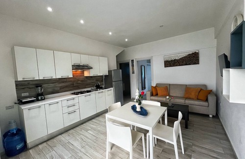 Los Melones Apartment | Modern apartment in private residence with pool