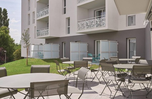 Jonzac Apartment | Modern apartment with a balcony located 500m from a spa town