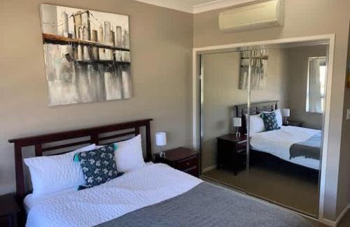 Barney Point Apartment | Modern Beach Apartment