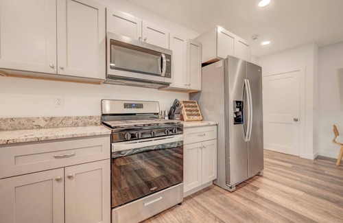 Milford House | Modern Bungalow Retreat: Walk to Arnolds Park, Relax with Fire Pit & Pergola