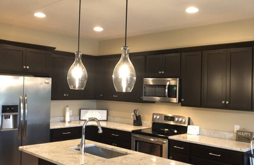 Arnolds Park Condo | Modern clean 2BR/2BA condo with patio & grill, in the heart of Okoboji, IA.