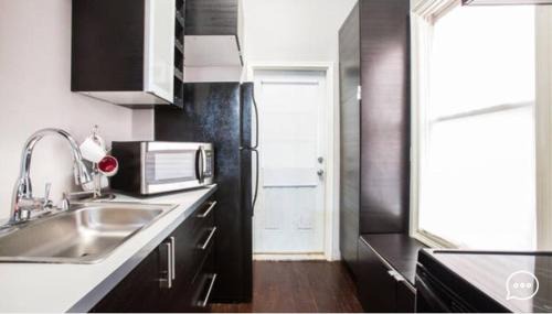 South 7th Ward Apartment | Modern Condo Blocks from Quarters