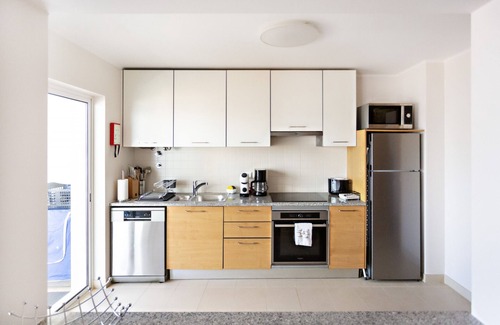 Cabanas Apartment | Modern, cozy apt with pool access