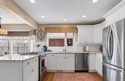 West Edmonton House | Modern Eclectic Home~Walk to WEM~AirCon~Yard~Hot Tub