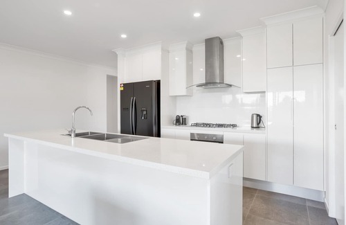 Trinity Beach House | Modern Home with Private Spa and Fenced Garden