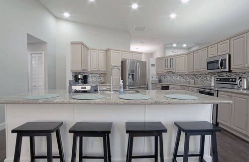Coral Springs Villa | Modern House near the Downtown Heated Pool Pet Friendly Whirlpool Spa Playroom