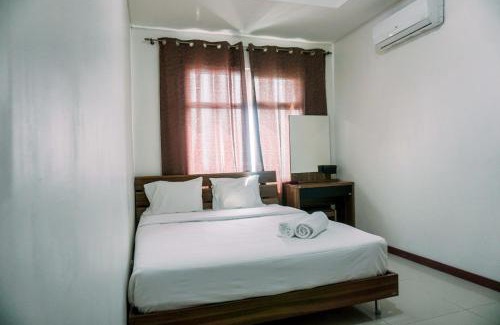 Pluit Apartment | Modern Look 1BR Green Bay Condominium Apartment By Travelio