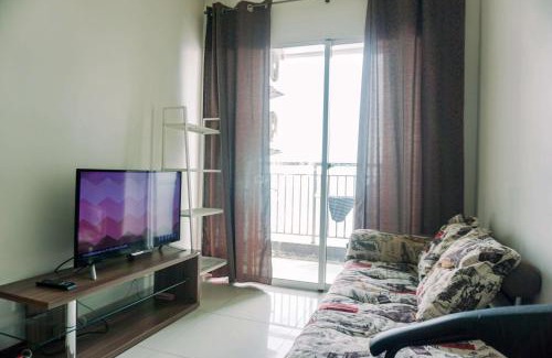 Pluit Apartment | Modern Look 1BR Green Bay Condominium Apartment By Travelio