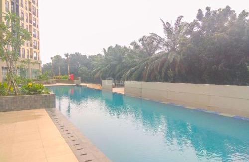 Depok Apartment | Modern Look and Comfy 2BR Transpark Cibubur Apartment By Travelio