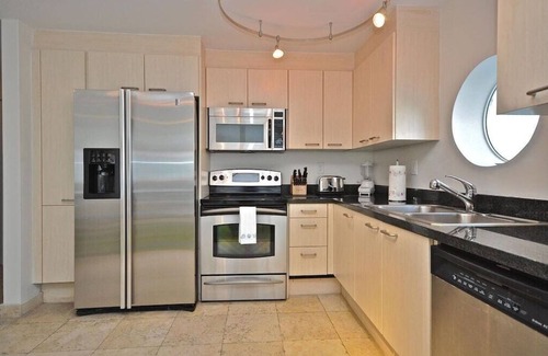 South of Fifth Condo | Modern Luxury Only Steps To The Sand! Huge Patio Deck, Modern Artwork & Extras