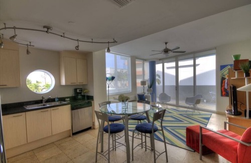 South of Fifth Condo | Modern Luxury Only Steps To The Sand! Huge Patio Deck, Modern Artwork & Extras