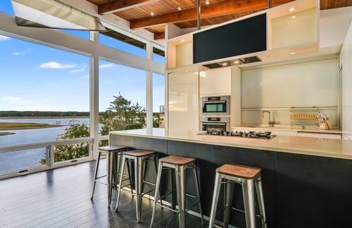 Buffalo Gap House | Modern Midcentury Lakefront with pool, hot tub, & private boat dock/Boat rentals