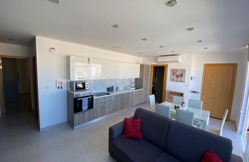 Qawra Apartment | Modern penthouse with a spacious terrace and view