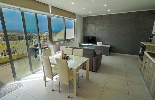 Qawra Apartment | Modern penthouse with a spacious terrace and view
