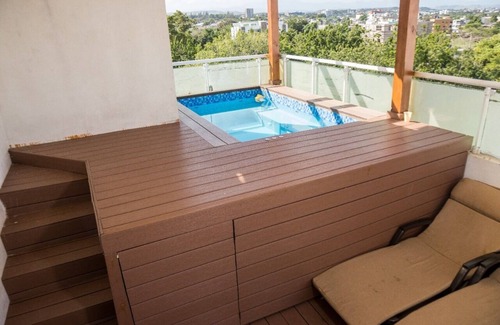 Santiago Province Apartment | Modern penthouse at Miramar, private picuzzi, terrace and city view