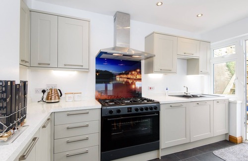 Looe House | Modern, pet friendly house with lovely river views of Looe river. Parking with free EV charger