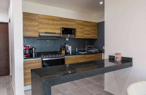 Cancun Apartment | Modern Retreat with Pool in Cancún